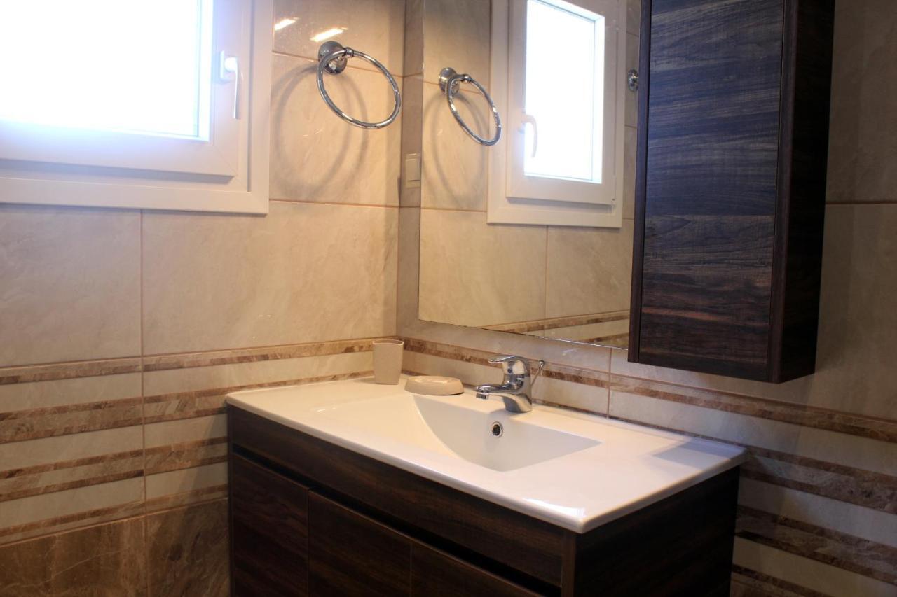 Theos Apartments Агиос Стефанос Экстерьер фото